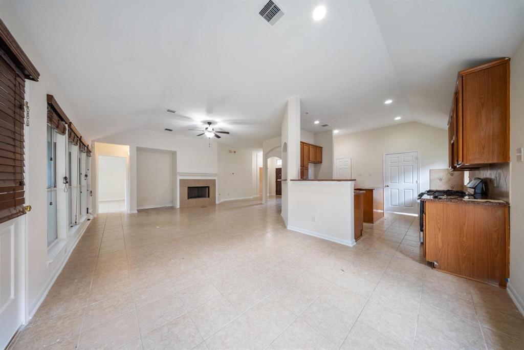 a view of a kitchen with a sink and a microwave