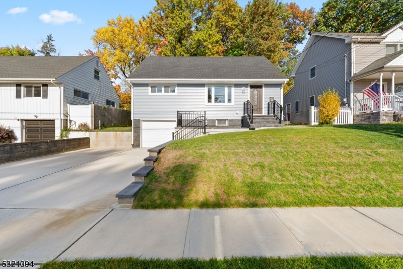 a house view with a garden space