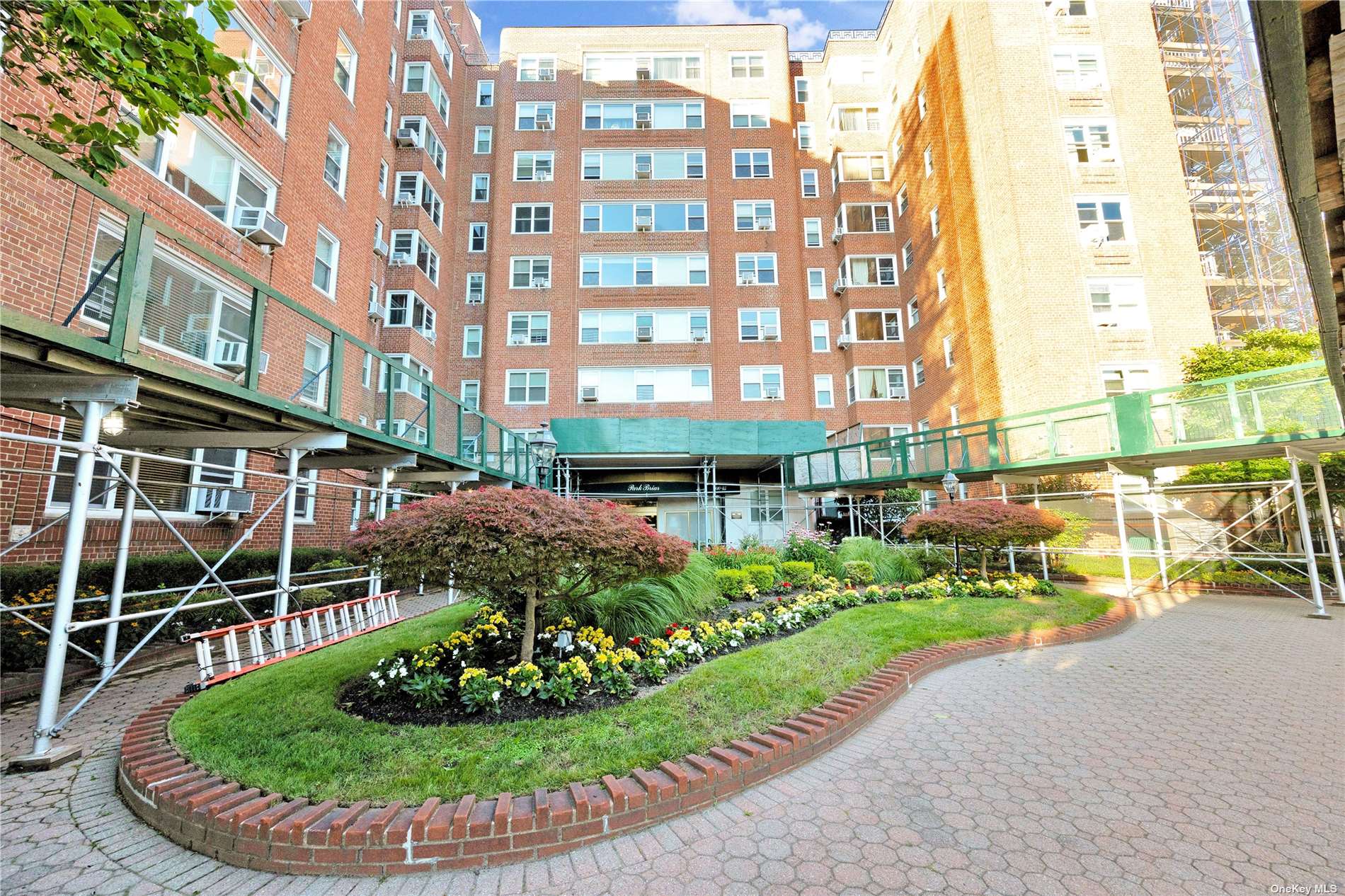 a view of a building with a garden