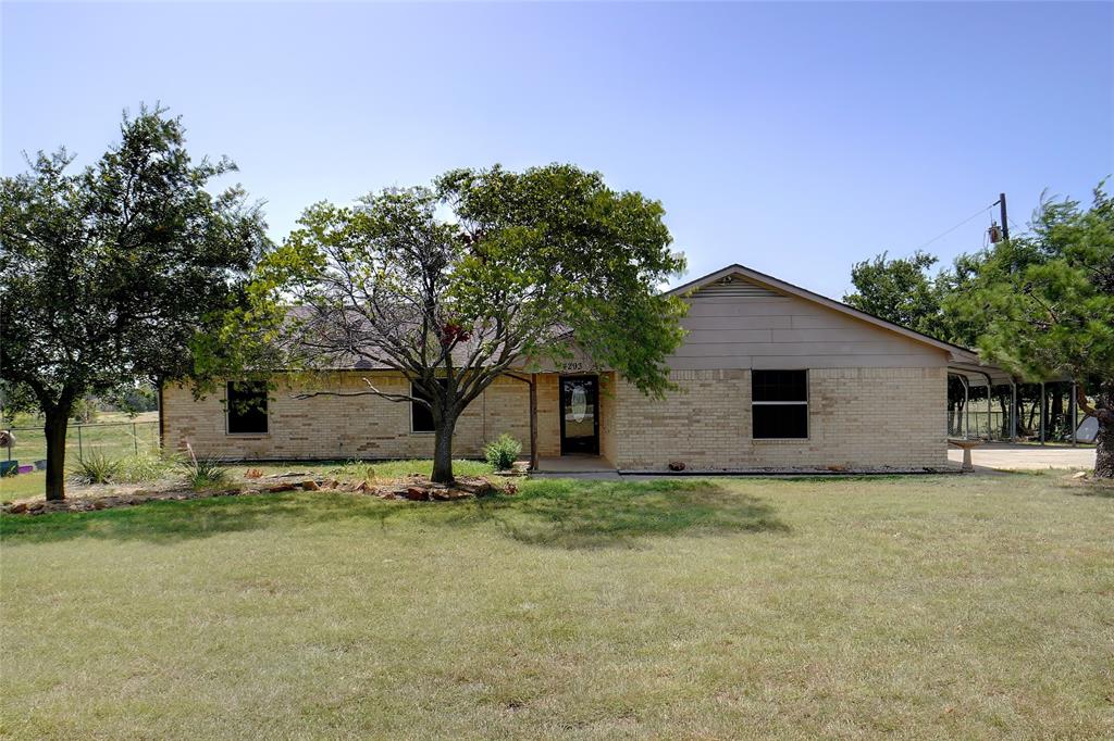 a house with trees in front of it