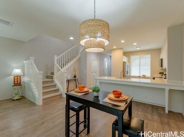 a dining room with a table and chairs