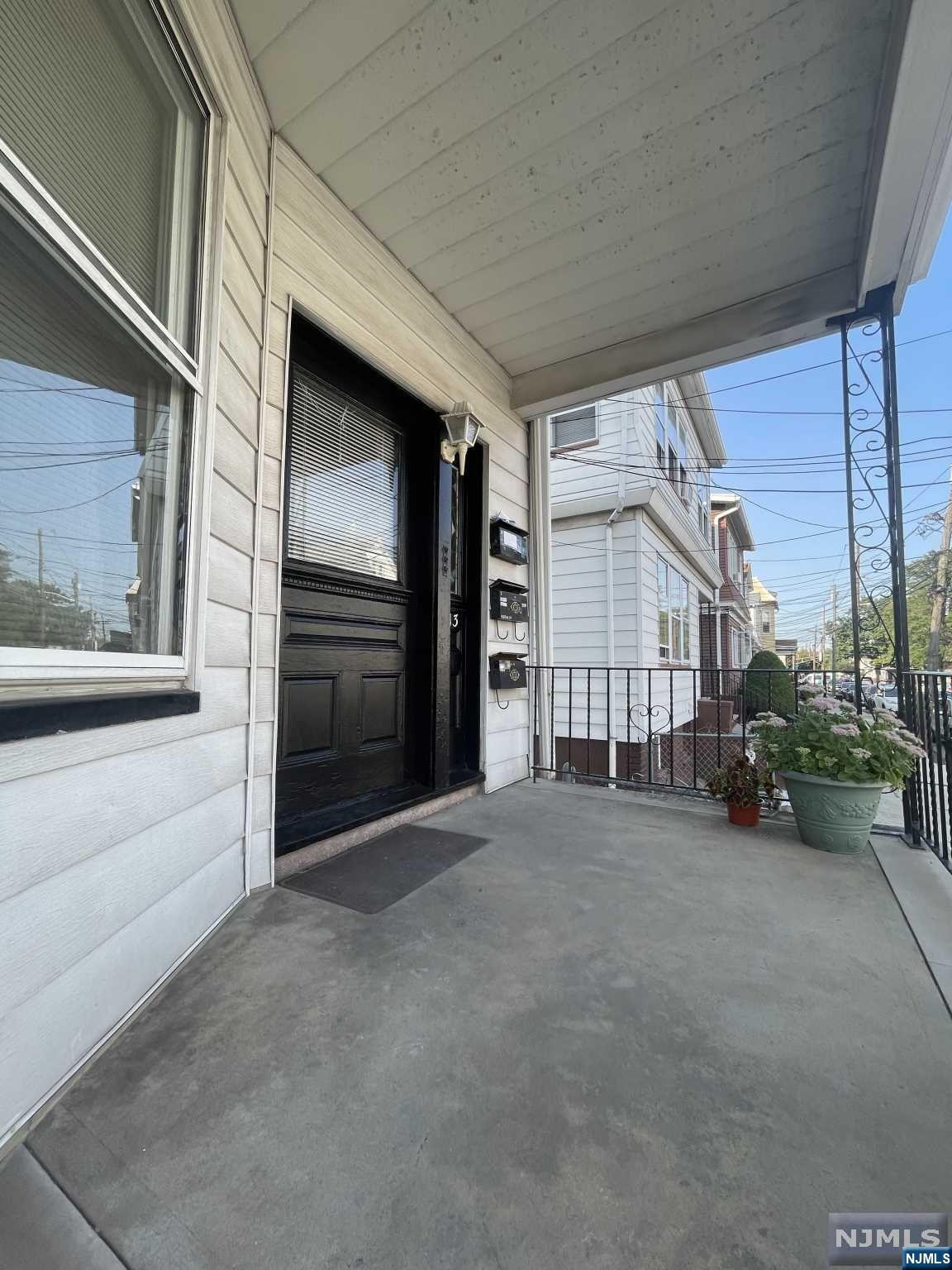 a view of a house with a street