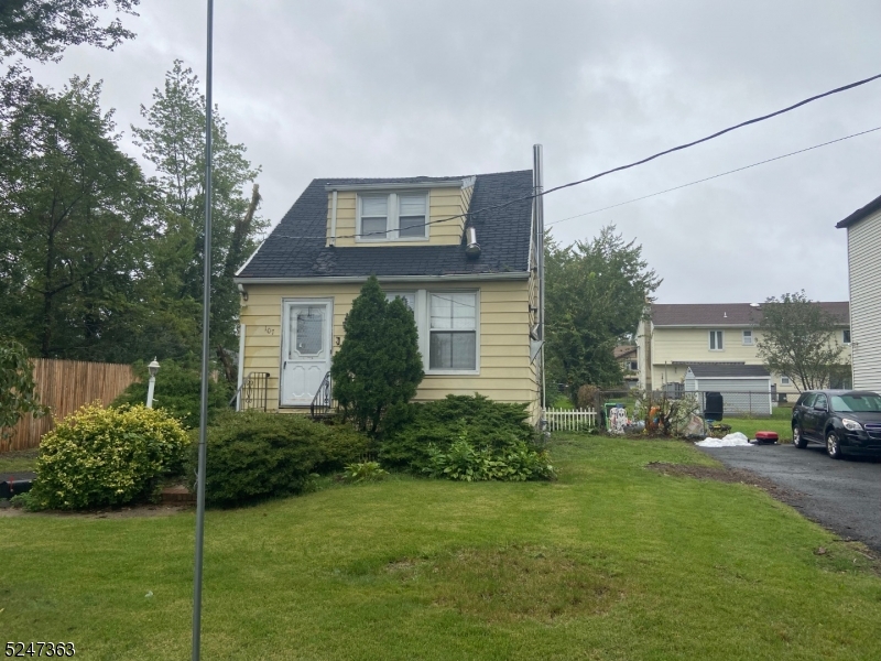 a house view with a garden space