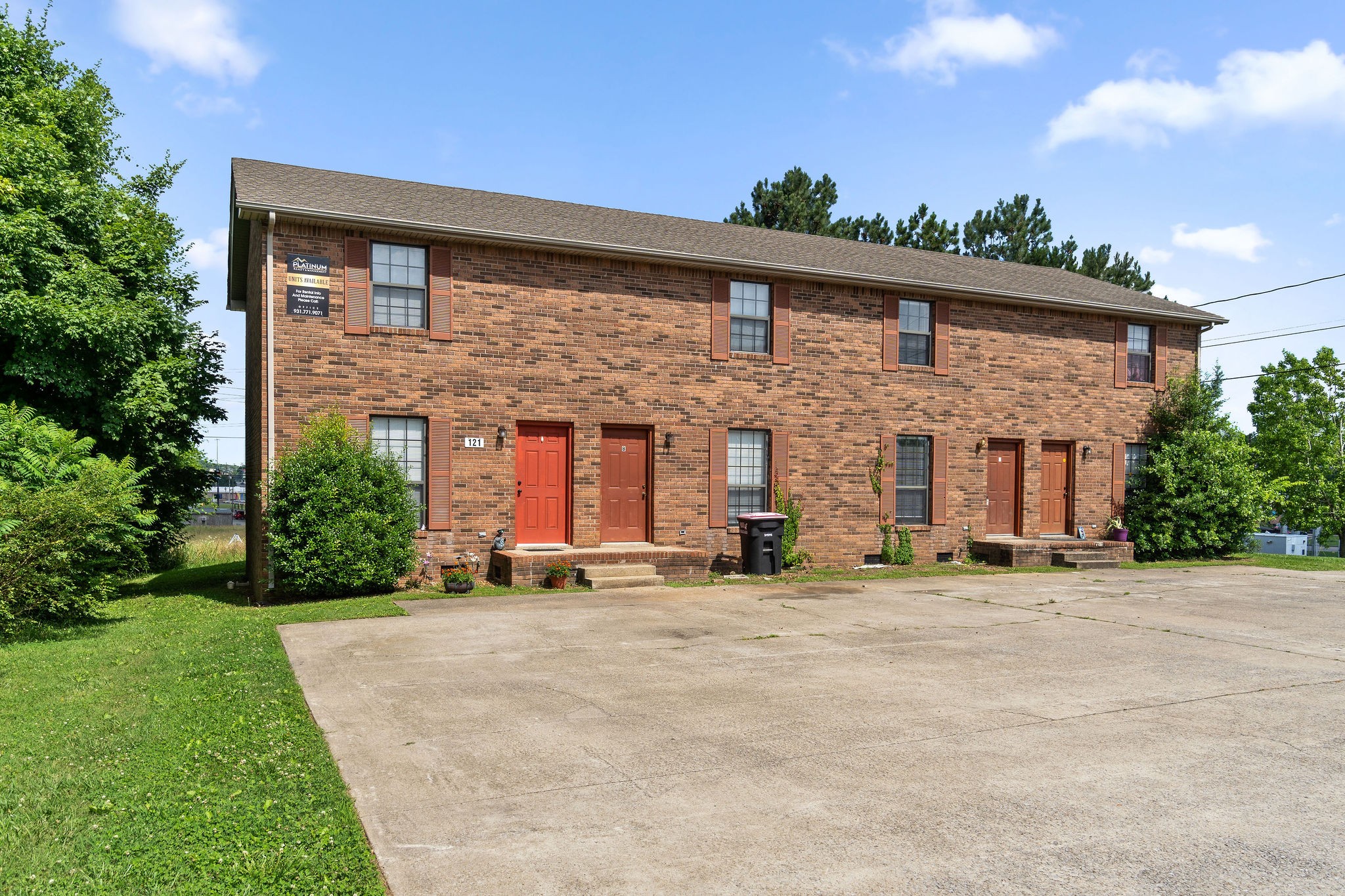 front view of a house with a yard