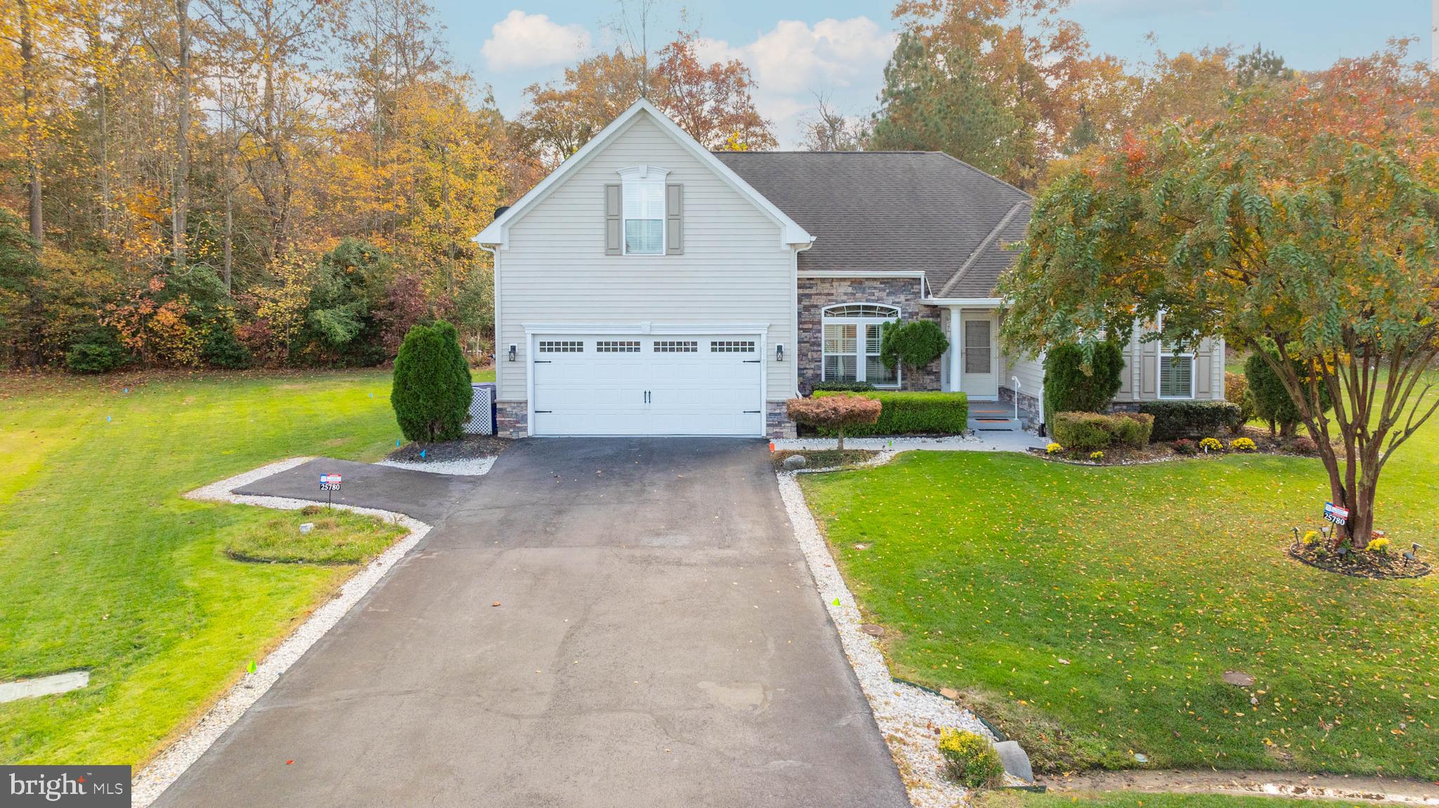 a view of a house with a back yard