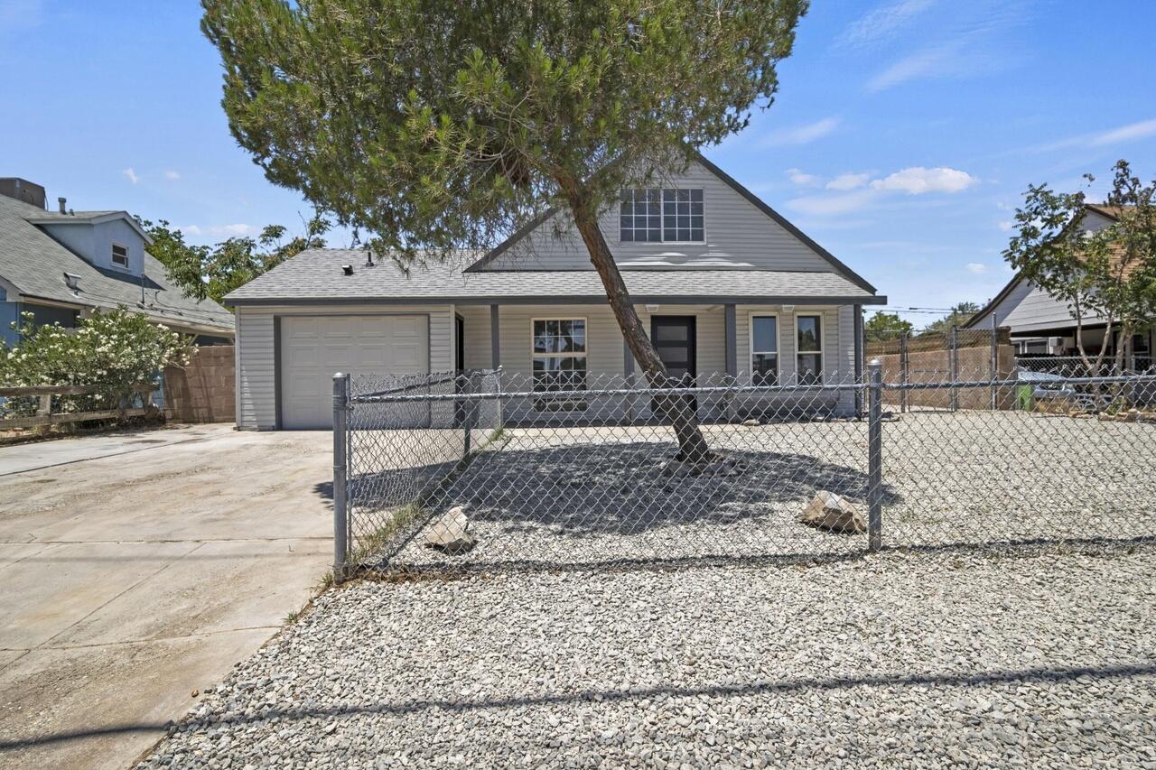 front view of a house with a dry yard