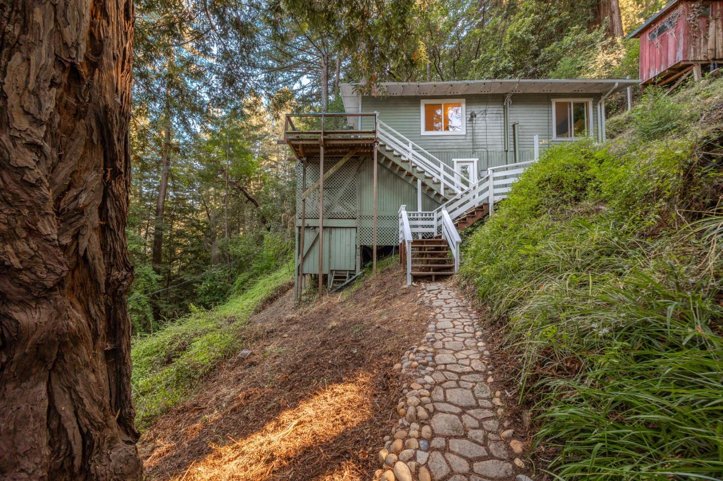 front view of a house with a yard