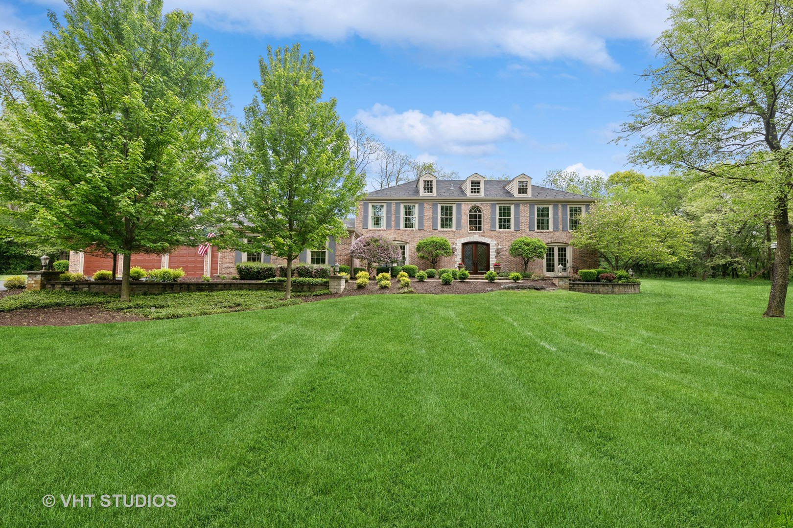 a view of a house with a big yard