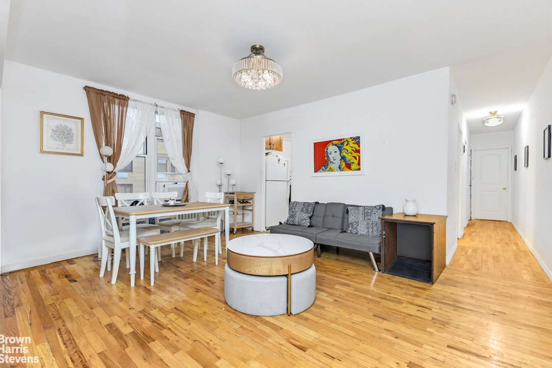 a living room with furniture and a table