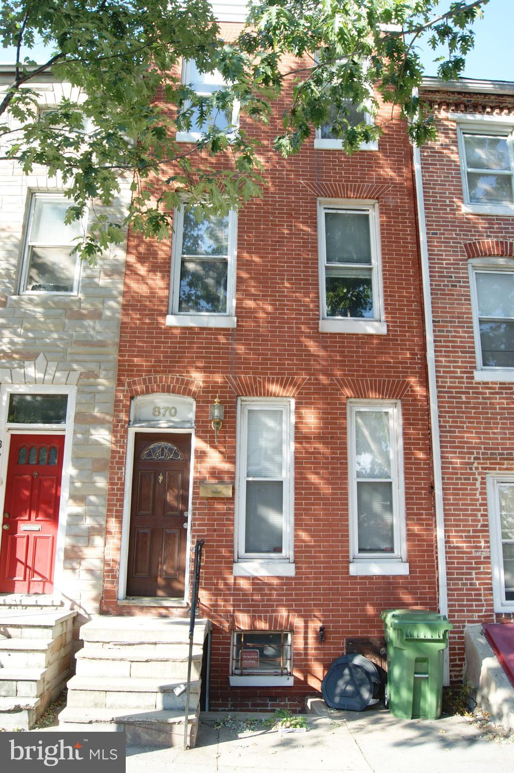 a front view of a multi story residential apartment building