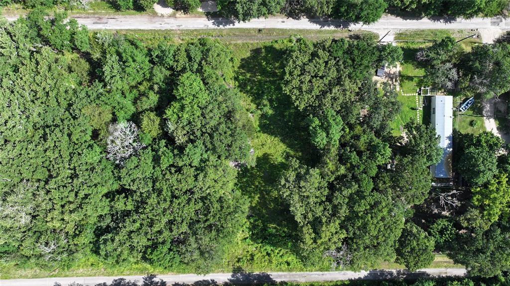 an aerial view of residential house with outdoor space