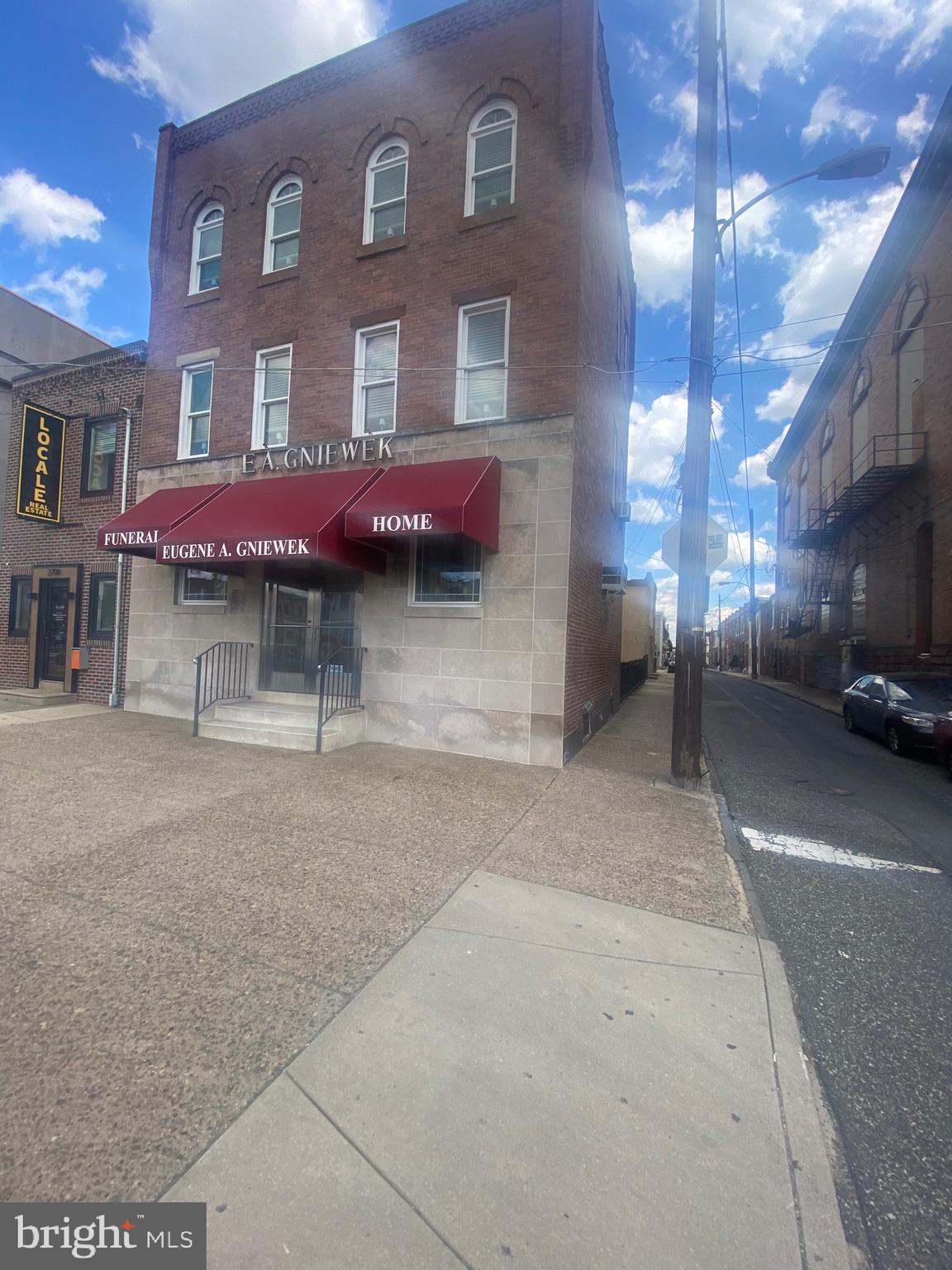 a view of a building with a patio