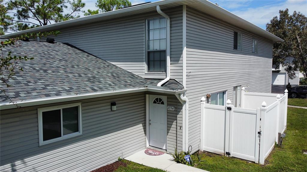 a front view of a house with garage