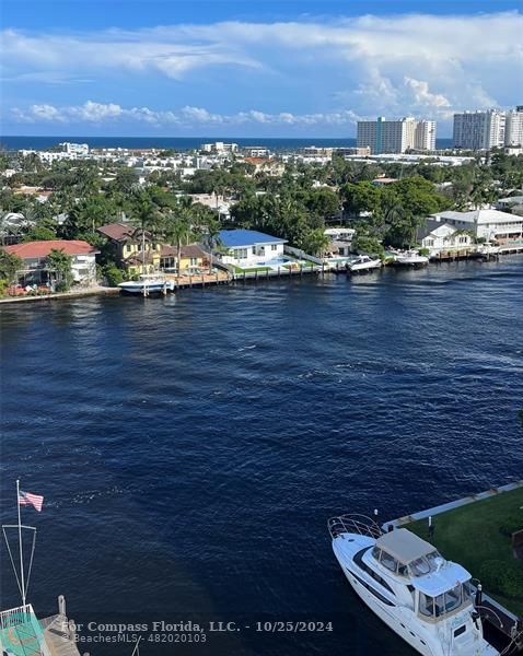 a view of a city with an ocean view