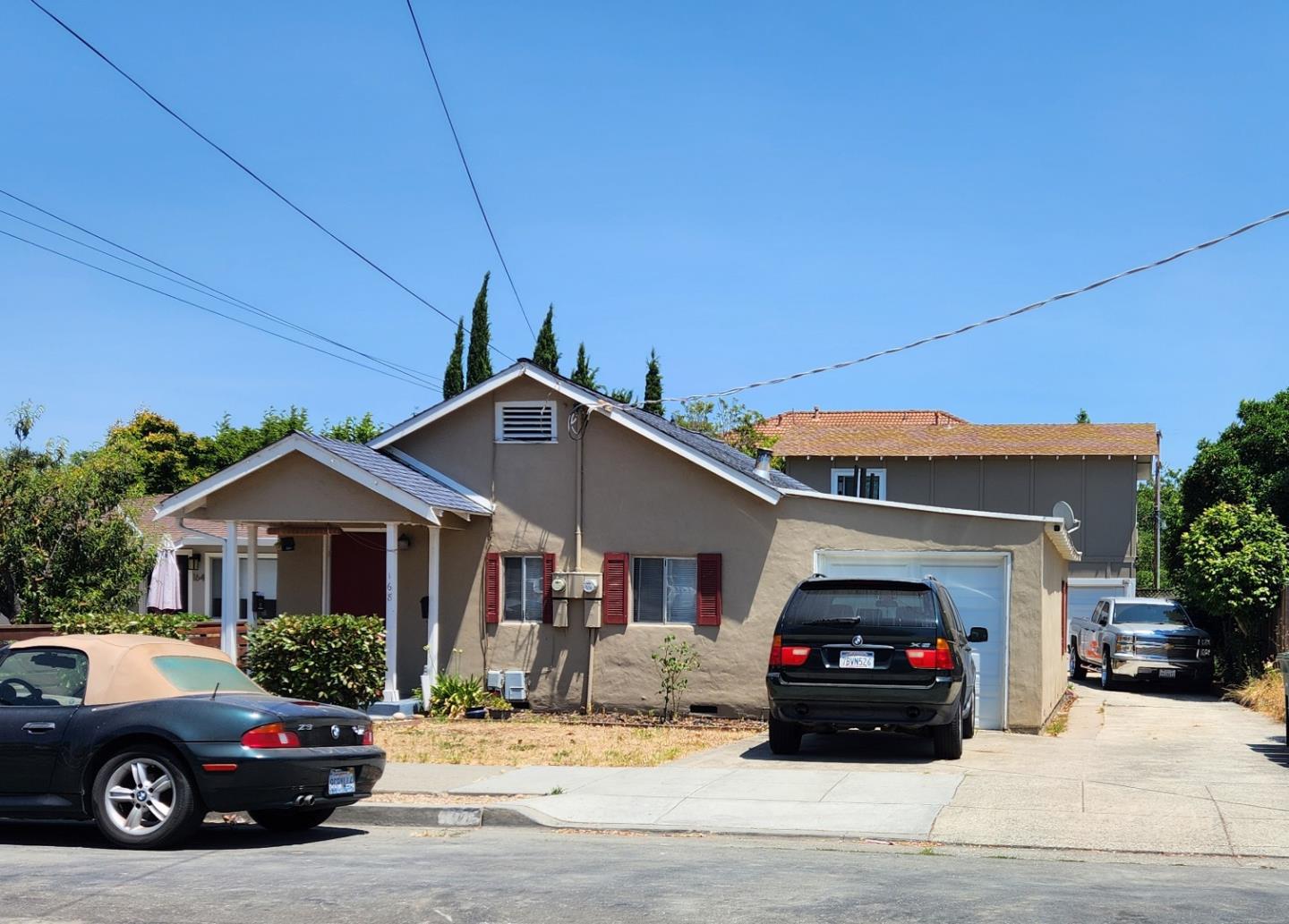 a car parked in front of a house