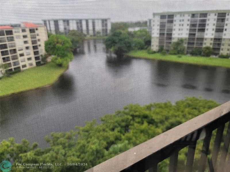 a view of a lake from a balcony