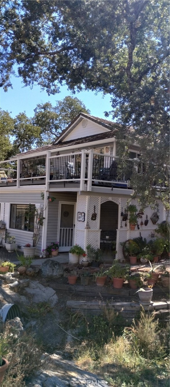 a front view of a house with yard