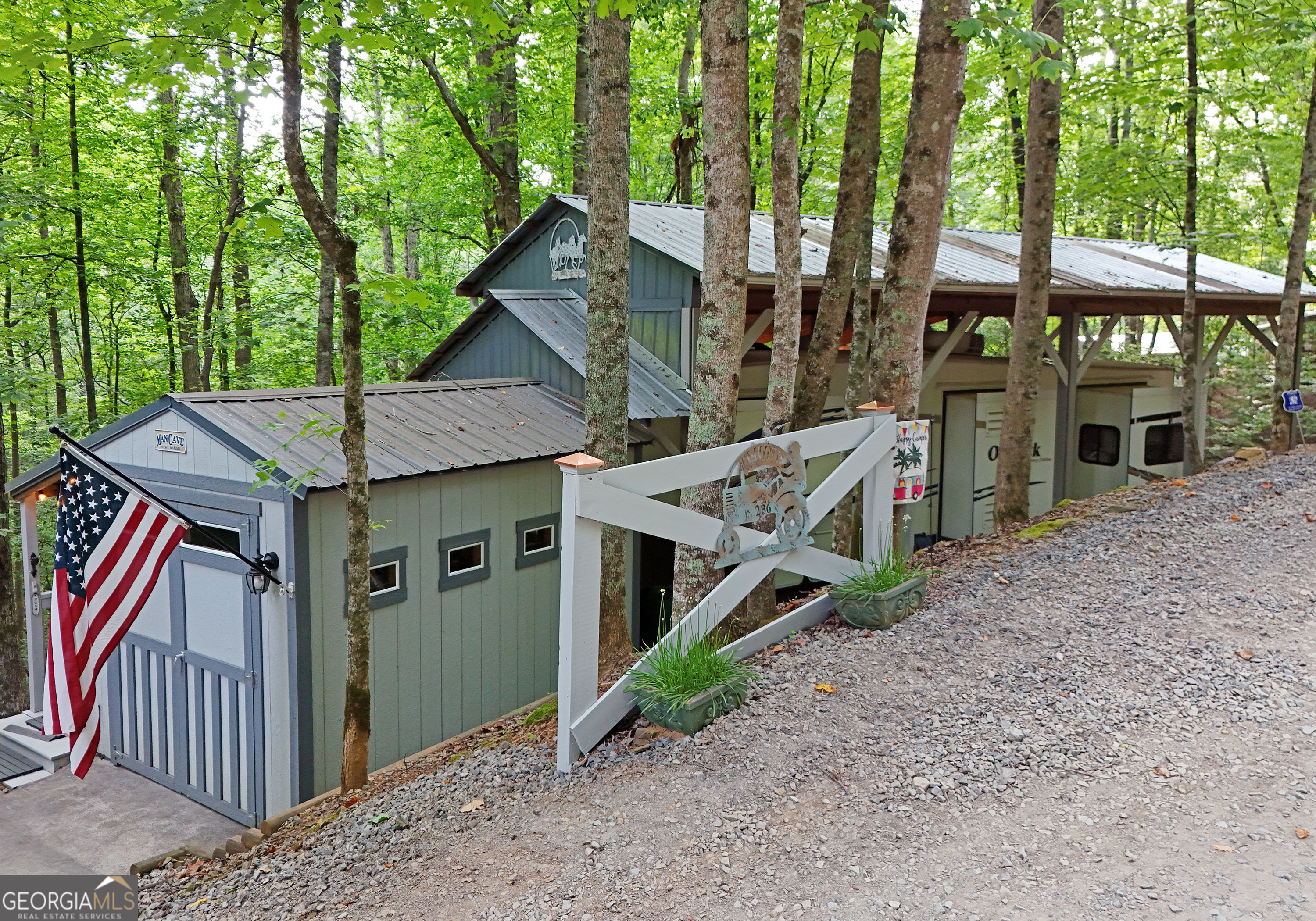 a view of a house with a backyard and balcony