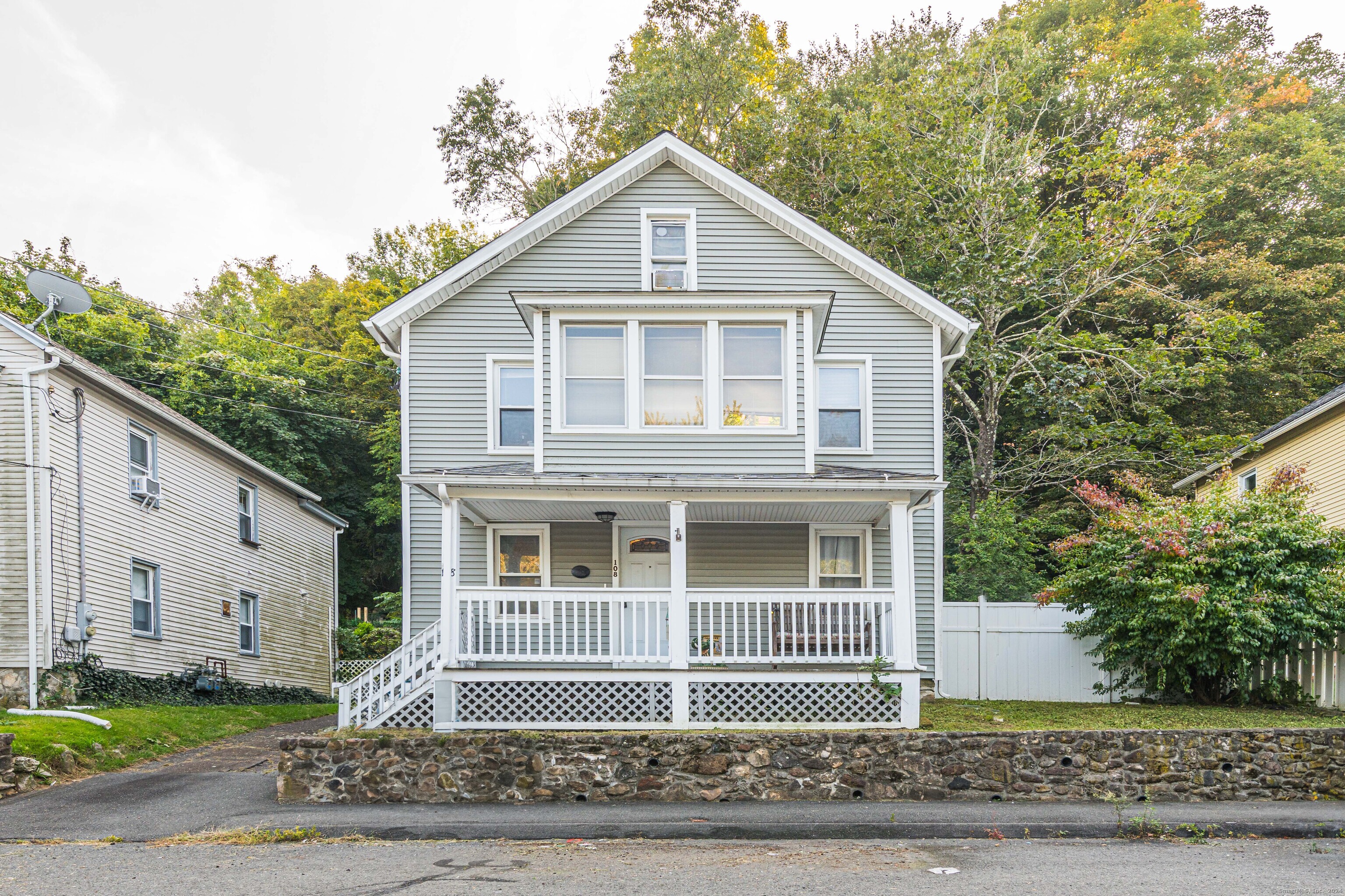 a front of a house with a yard