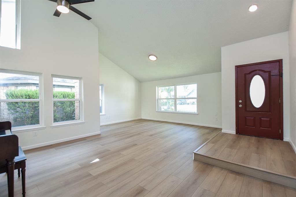 a view of a furniture in a room with a window