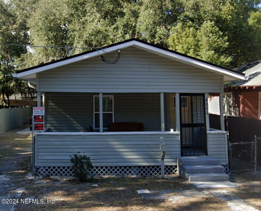 a front view of a house with garage