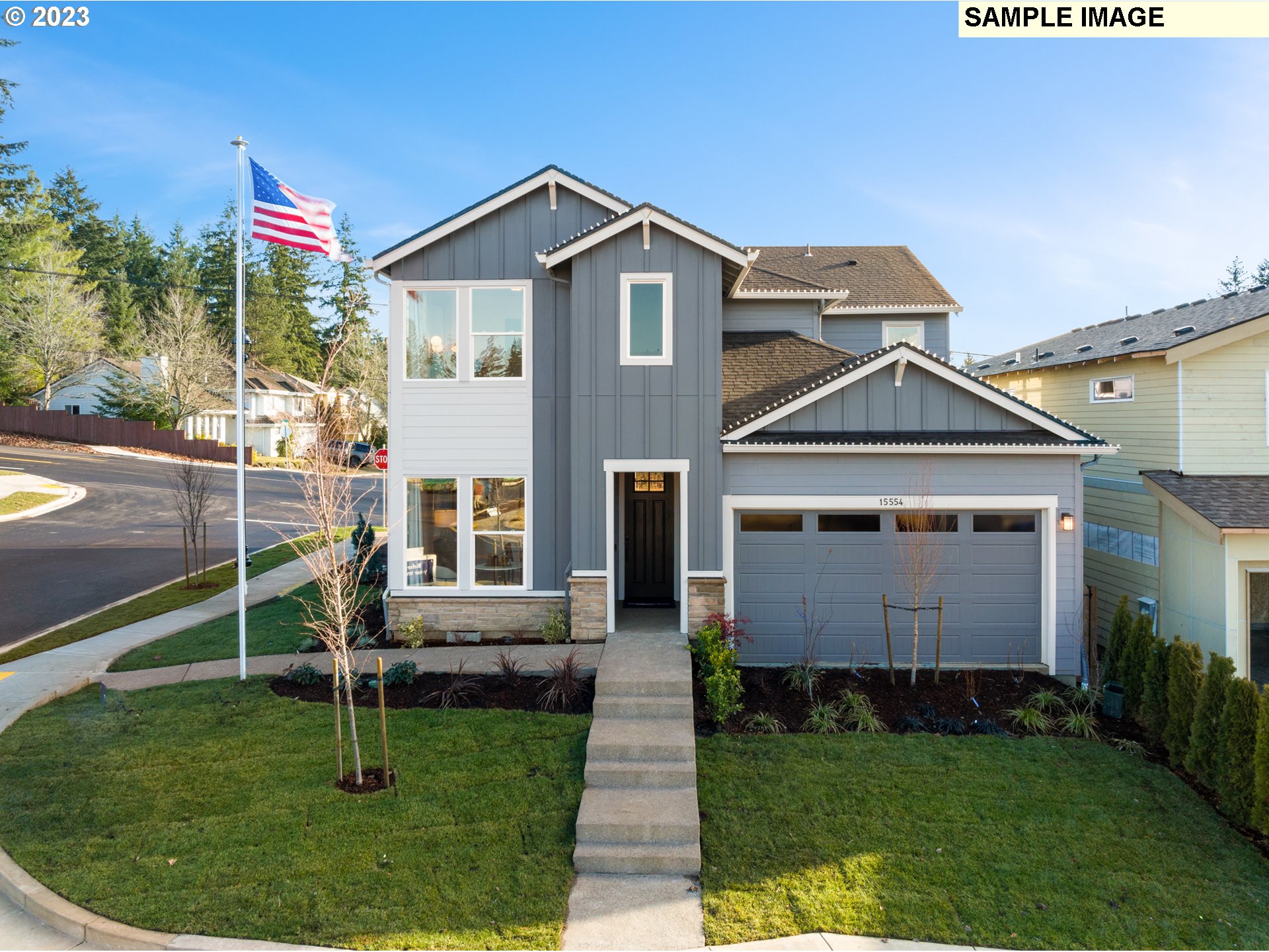 a front view of a house with a yard