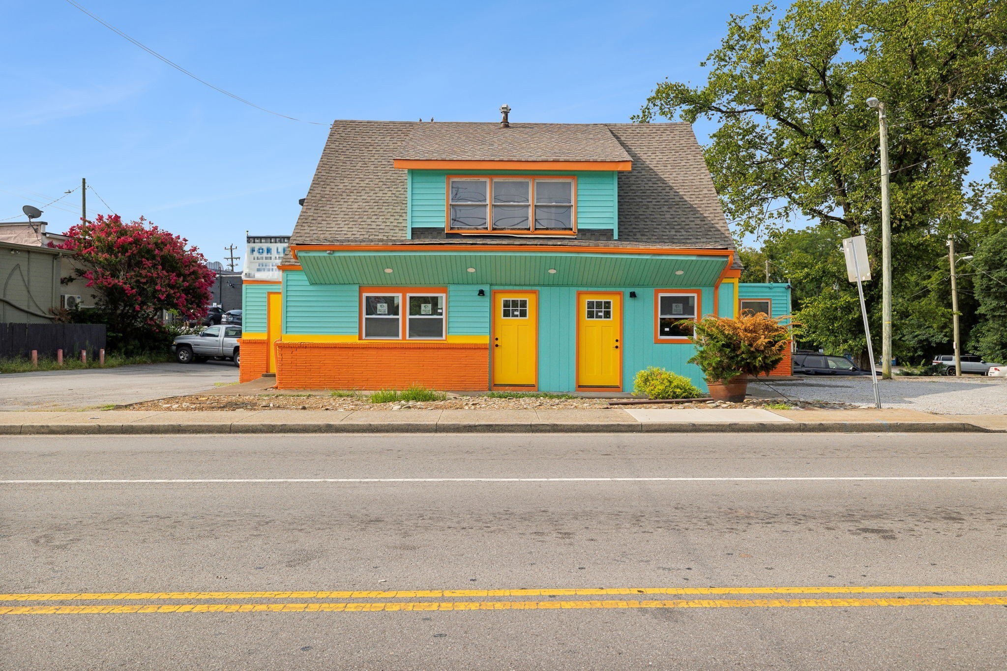 front view of a house with a street