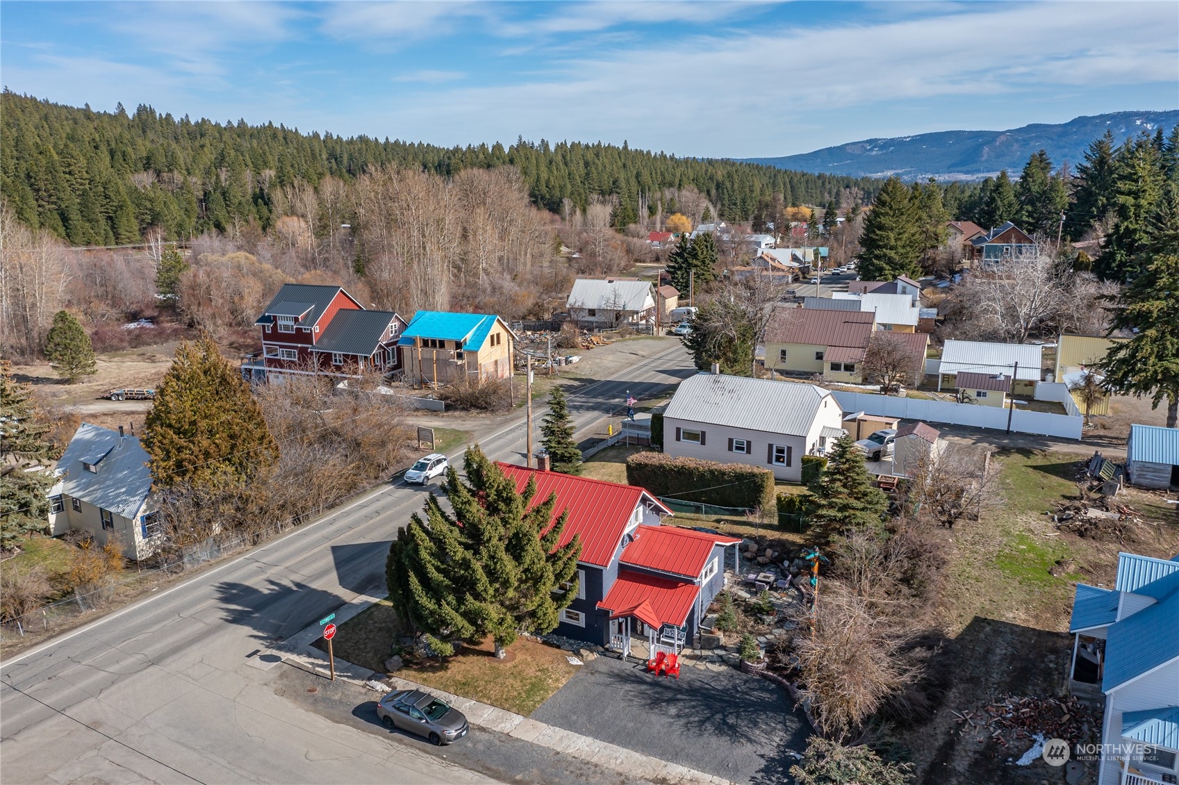 an aerial view of a house with a lake view