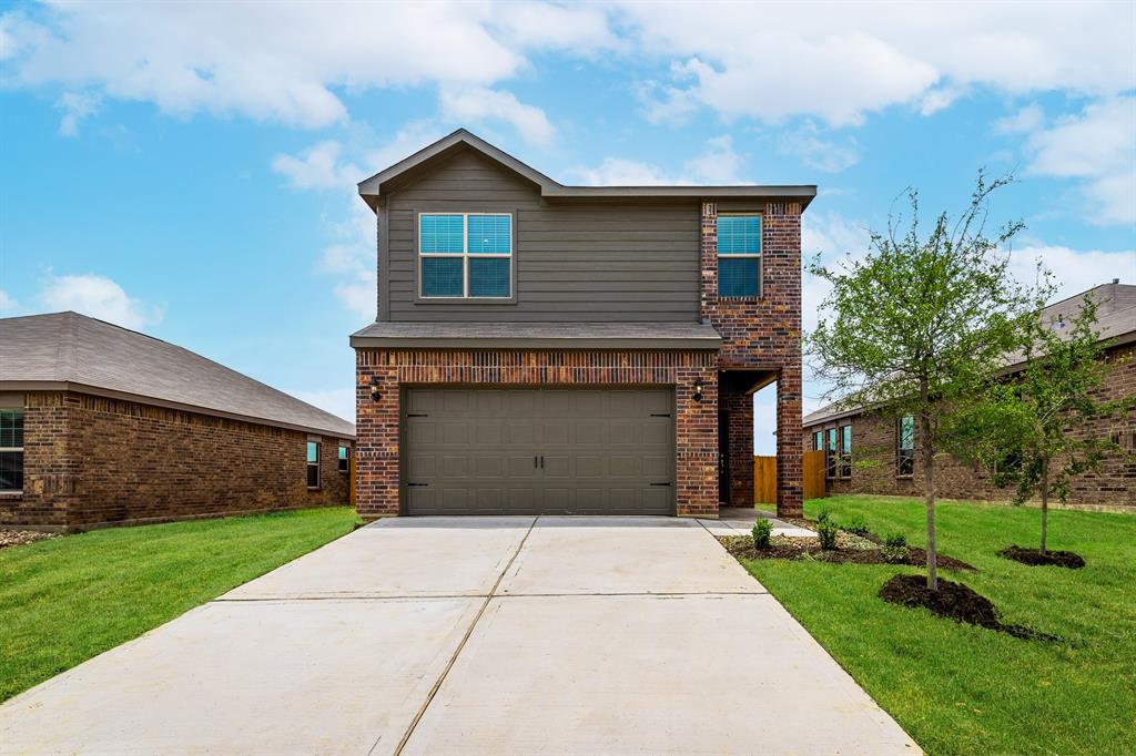 a front view of house with yard