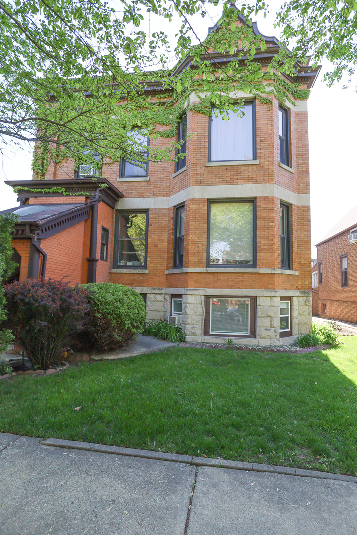 front view of house with a yard