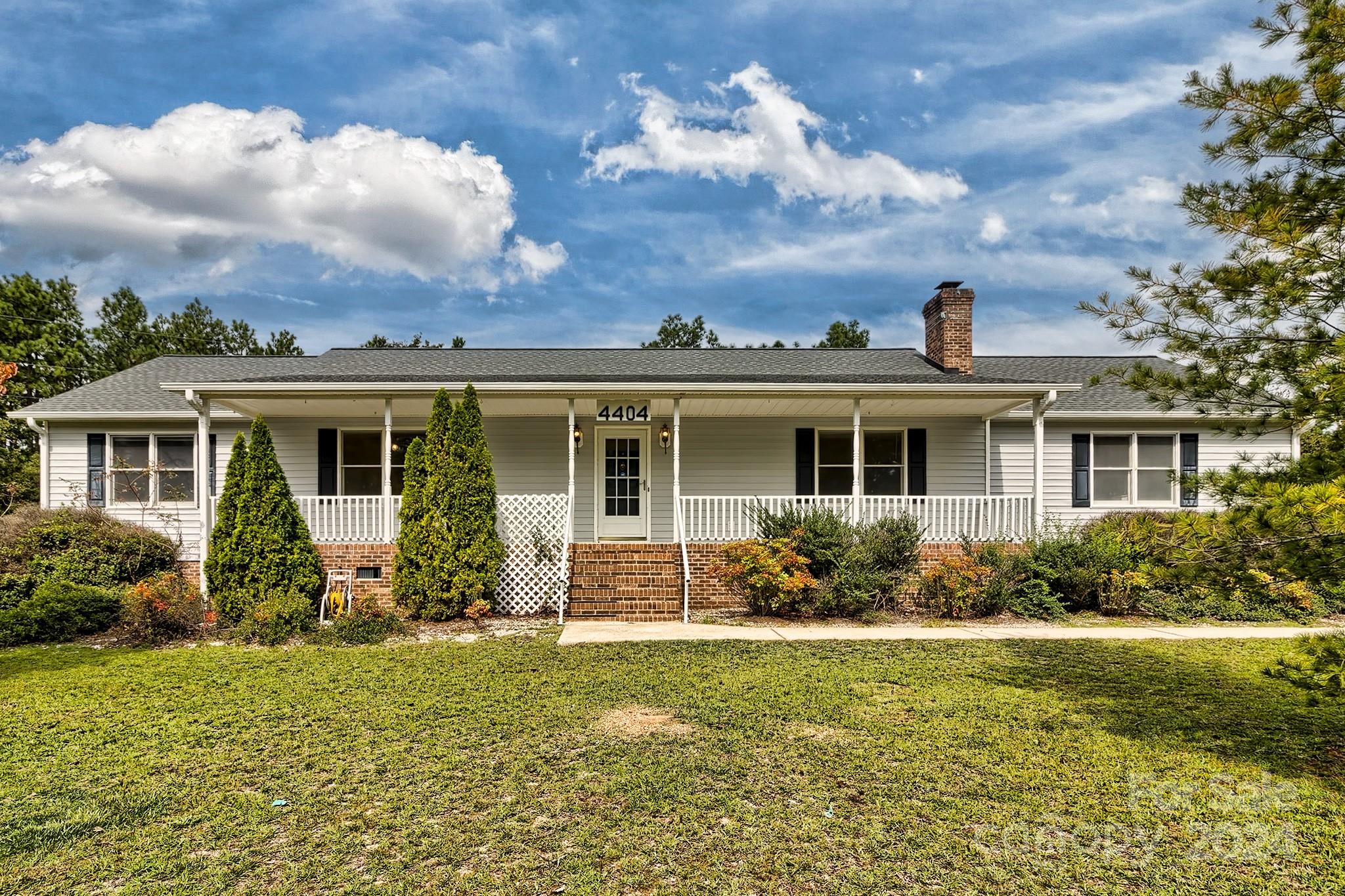 front view of house with a yard