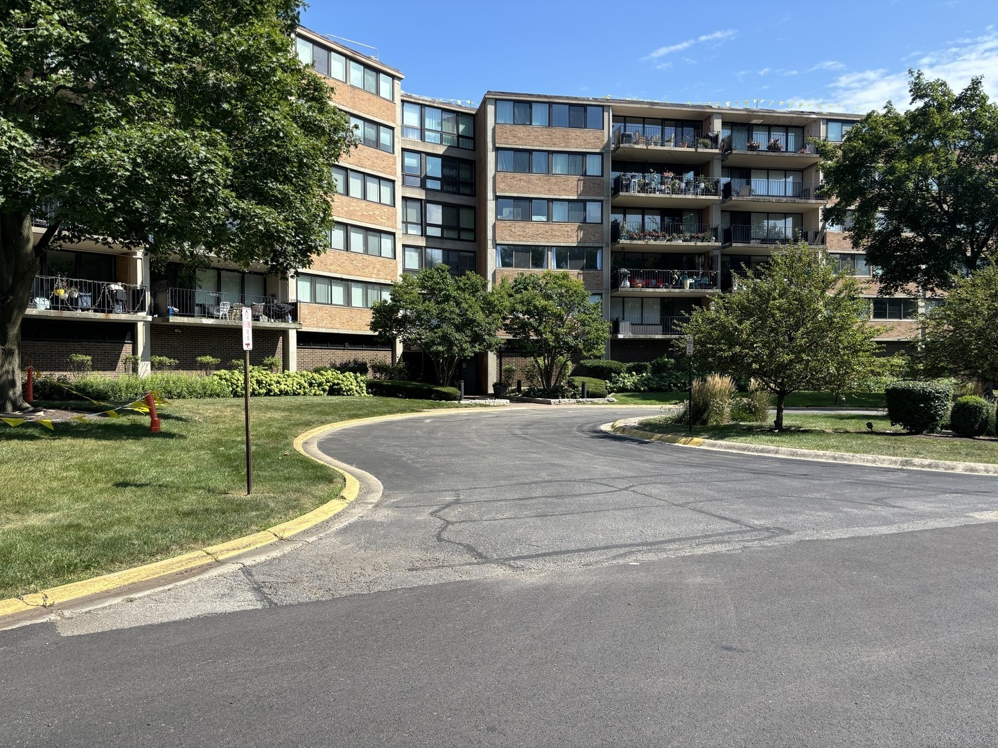 a view of a building with a yard