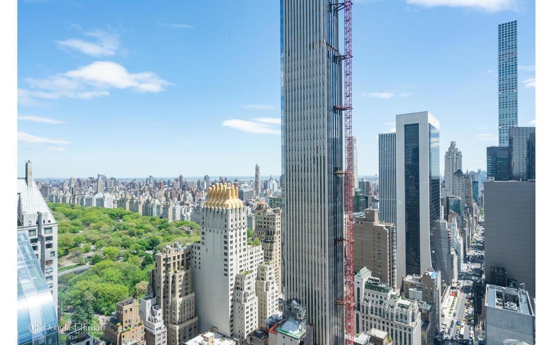 a view of a city with tall buildings