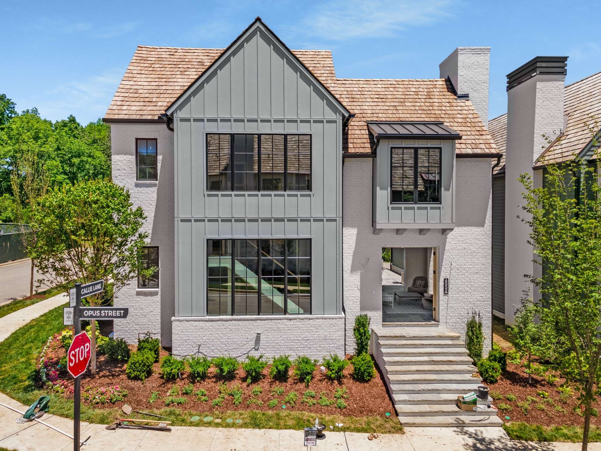 a front view of a house with a yard