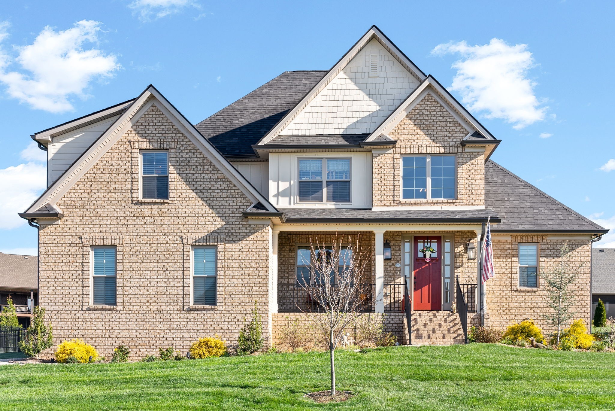 a front view of a house with garden