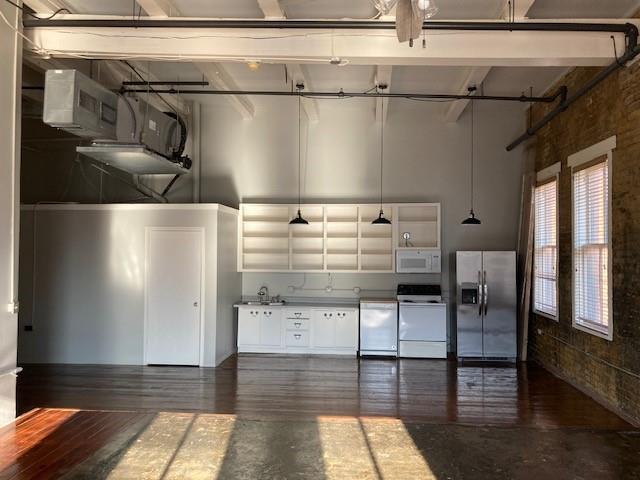 a view of entryway with wooden floor