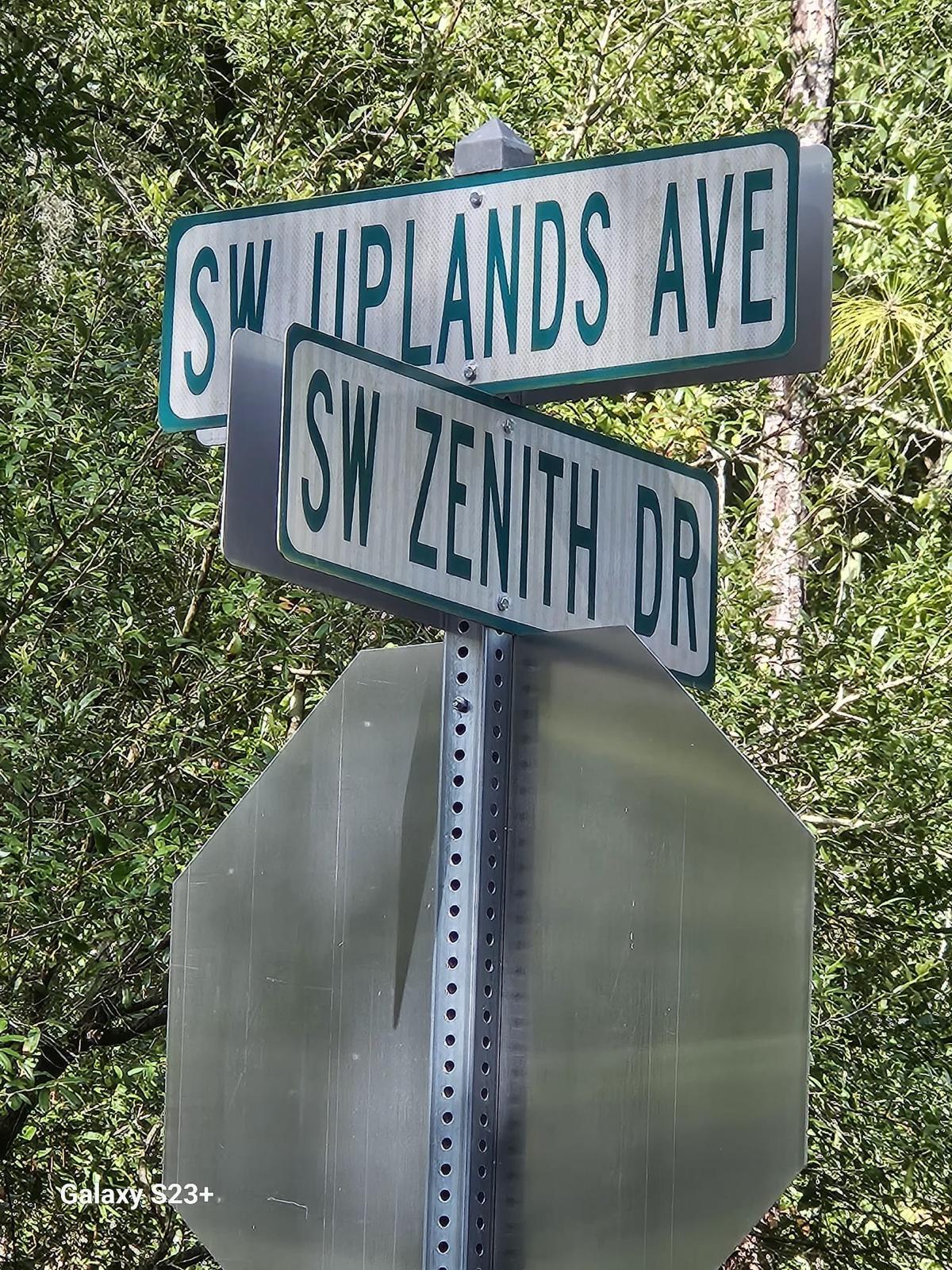 a street sign that is on a pole