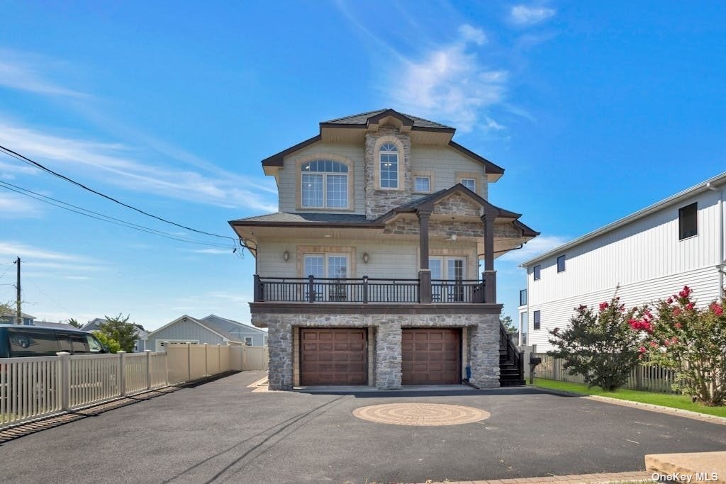 a view of a house with a garage