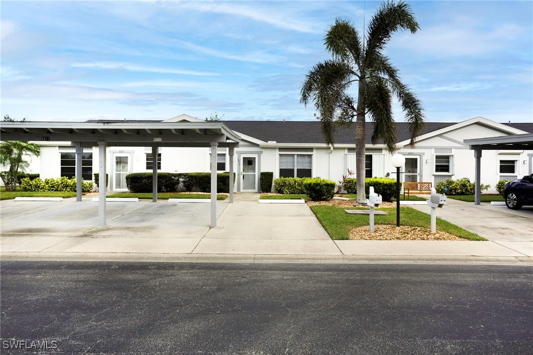 a view of multiple houses with a yard