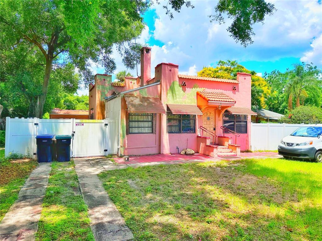 front view of a house with a yard