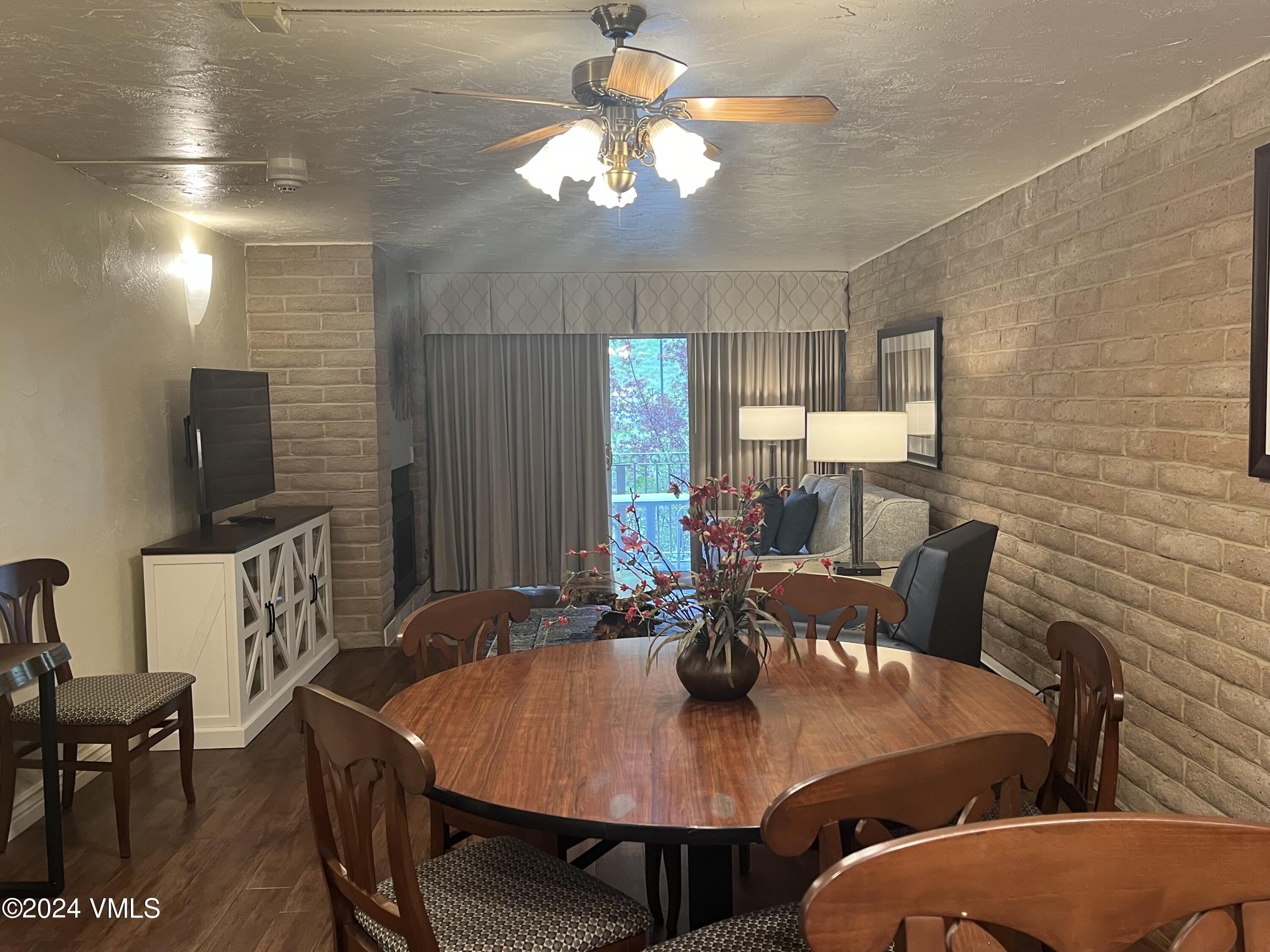 a view of a dining room with furniture