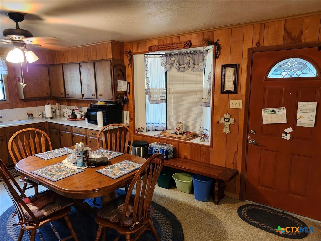 a view of a dining room with furniture