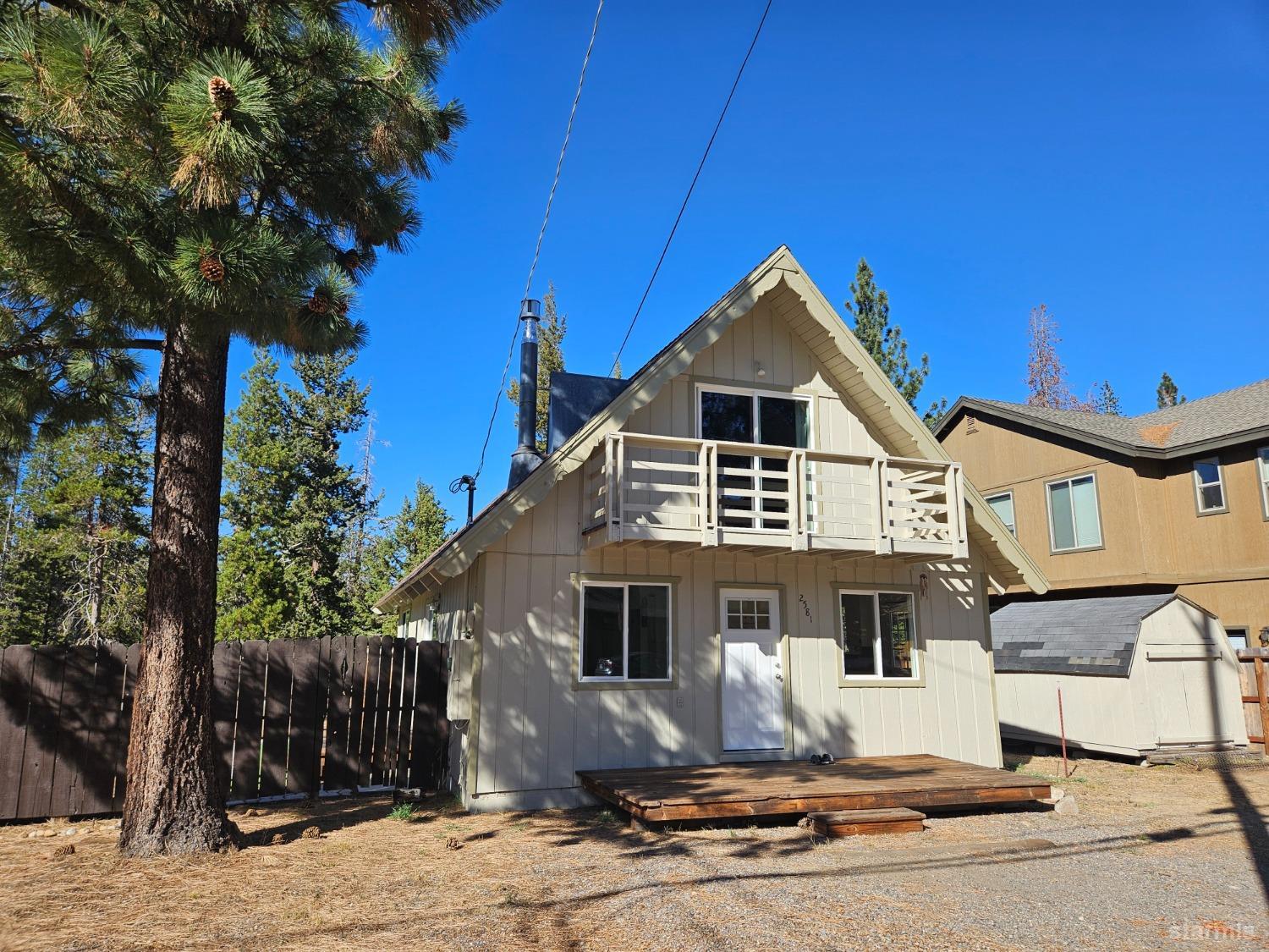 a front view of a house with yard