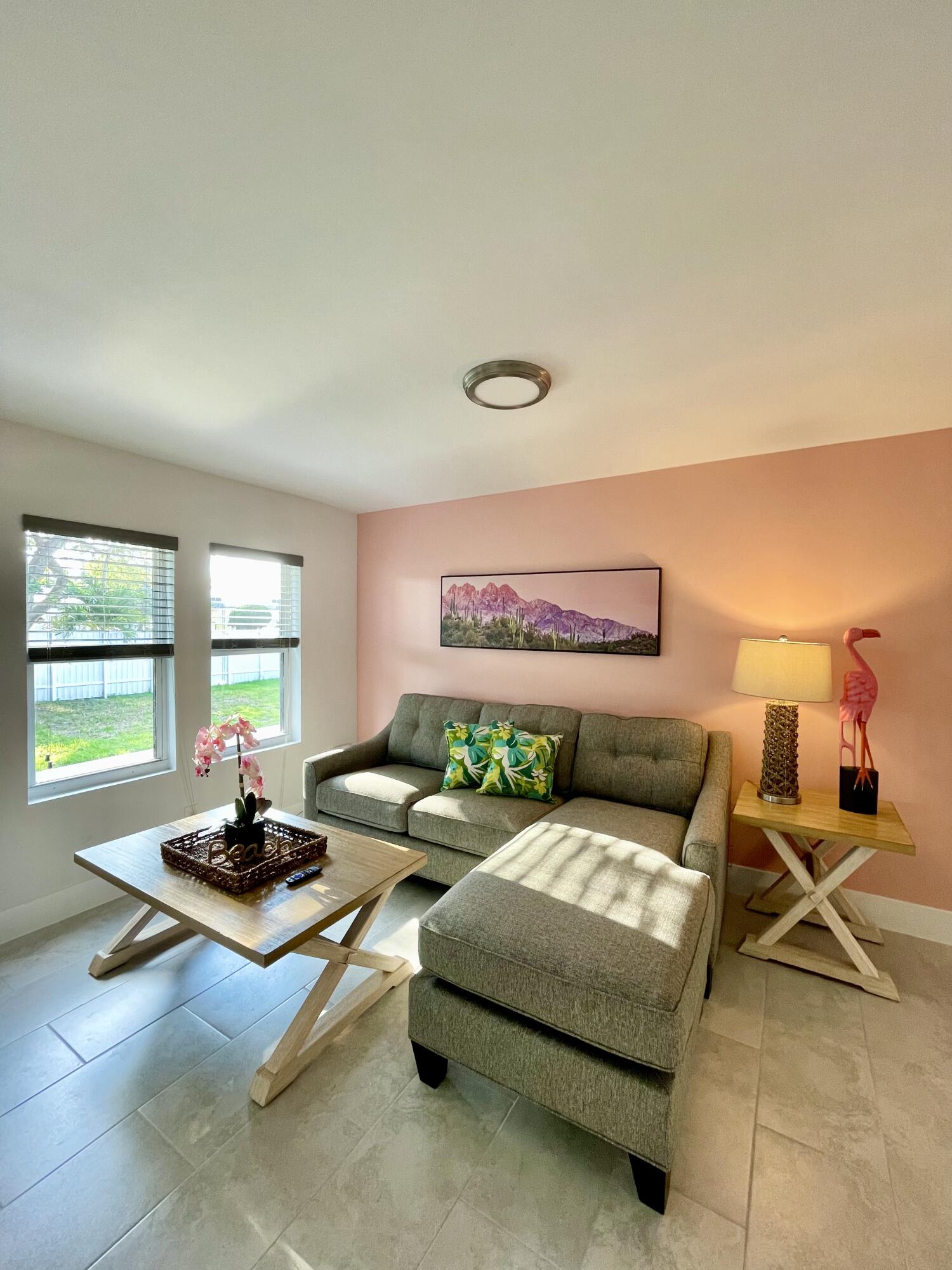 a living room with furniture and a window