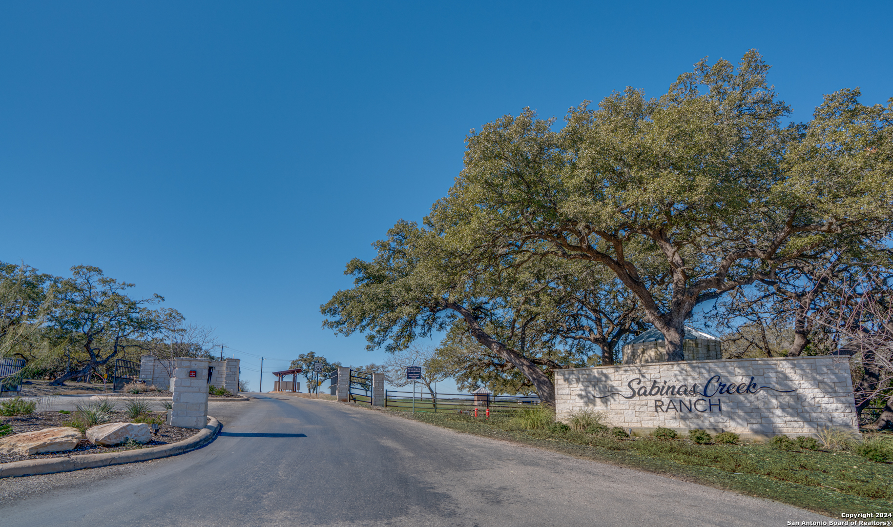 a view of a road with a building in the background