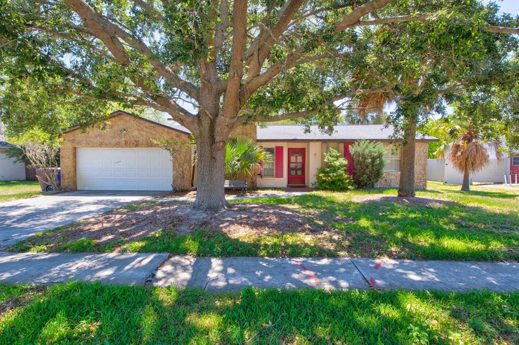 a front view of house with yard