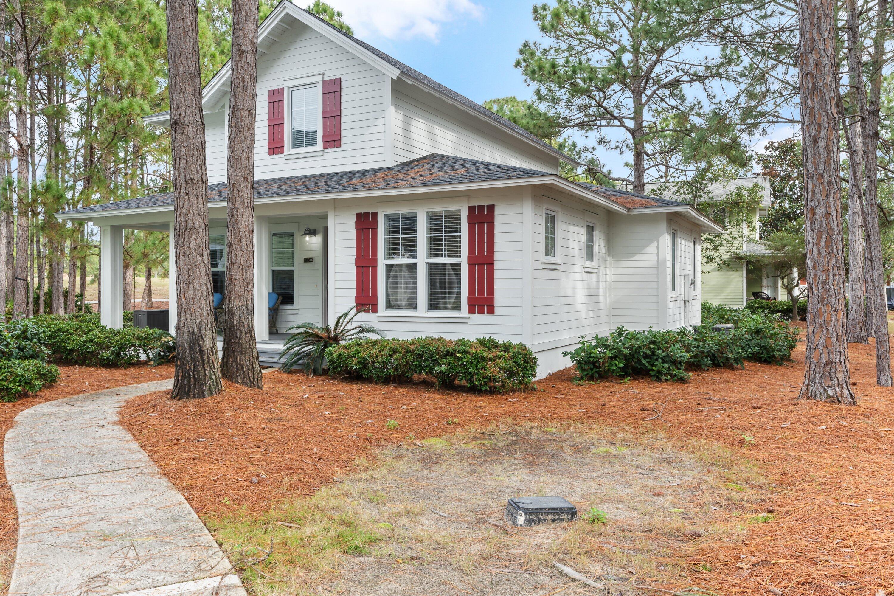 front view of a house with a yard