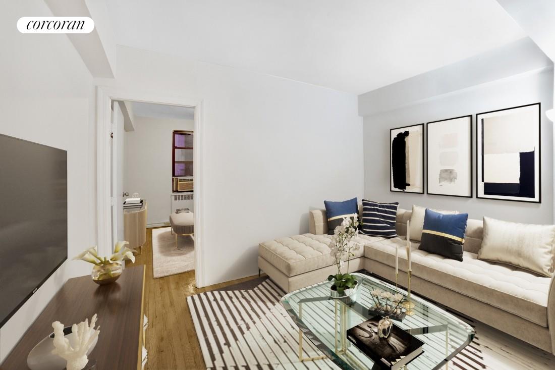 a living room with furniture and a rug