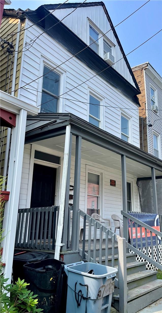 View of front facade featuring covered porch