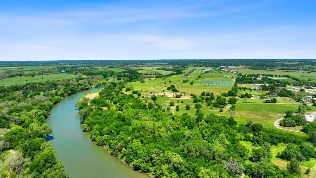 a view of a lake with a city